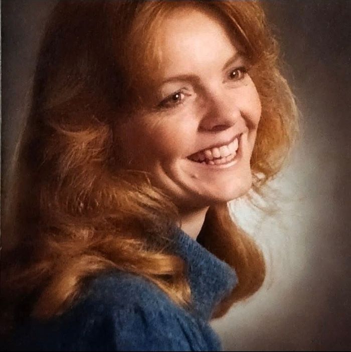 Sharla as a young woman, smiling